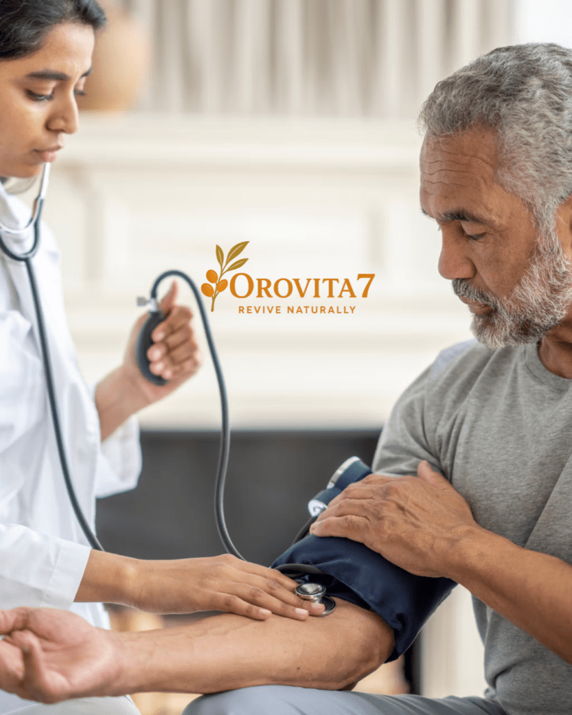A female healthcare professional checking the blood pressure of a senior man using a manual cuff and stethoscope, featuring the OroVita7 logo overlay.