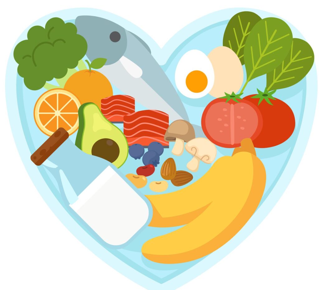 A variety of colorful, healthy foods including salmon, avocado, nuts, berries, and leafy greens arranged in the shape of a heart to represent a diet that lowers cholesterol.