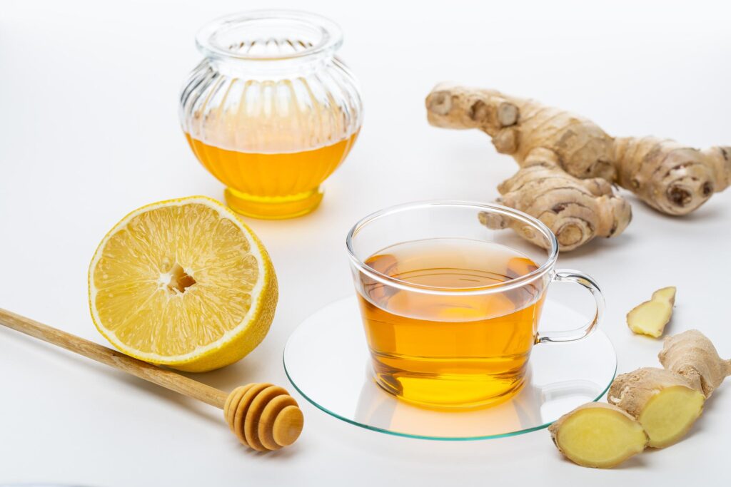 Healthy Immunity Boosting Drinks with oranges, lemon, and herbal ingredients