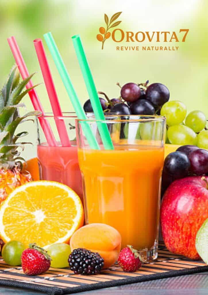 Refreshing glasses of orange and pink juice with colorful straws, nestled among a bounty of pineapples, grapes, apples, and berries under the OroVita7 logo.