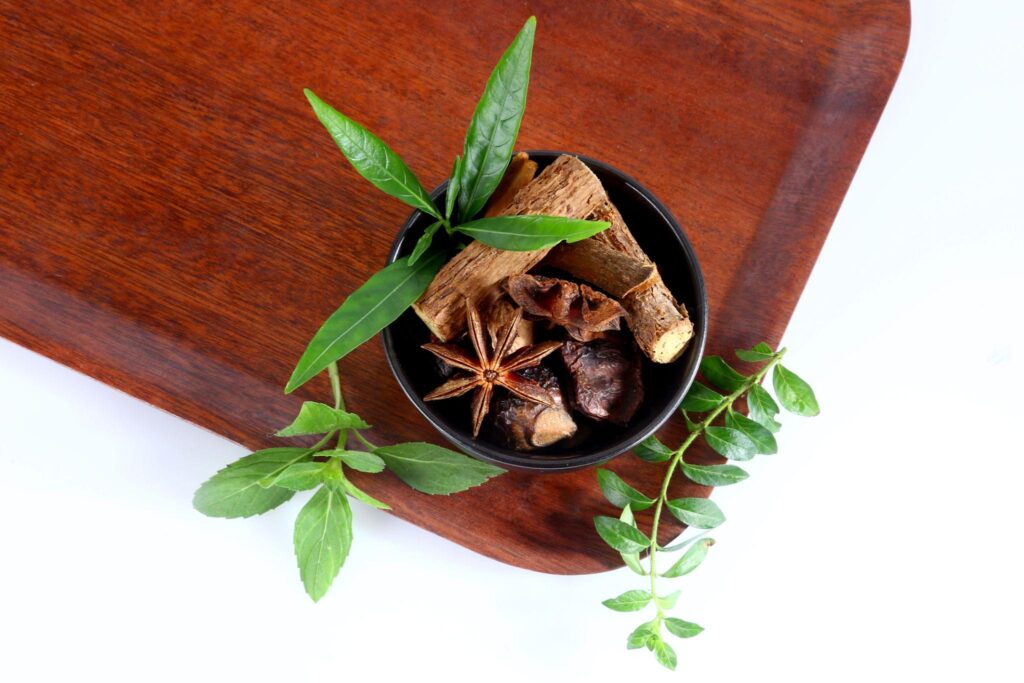 Ayurveda and Nutrition concept showing natural herbs, spices, and healthy organic foods for balanced wellness