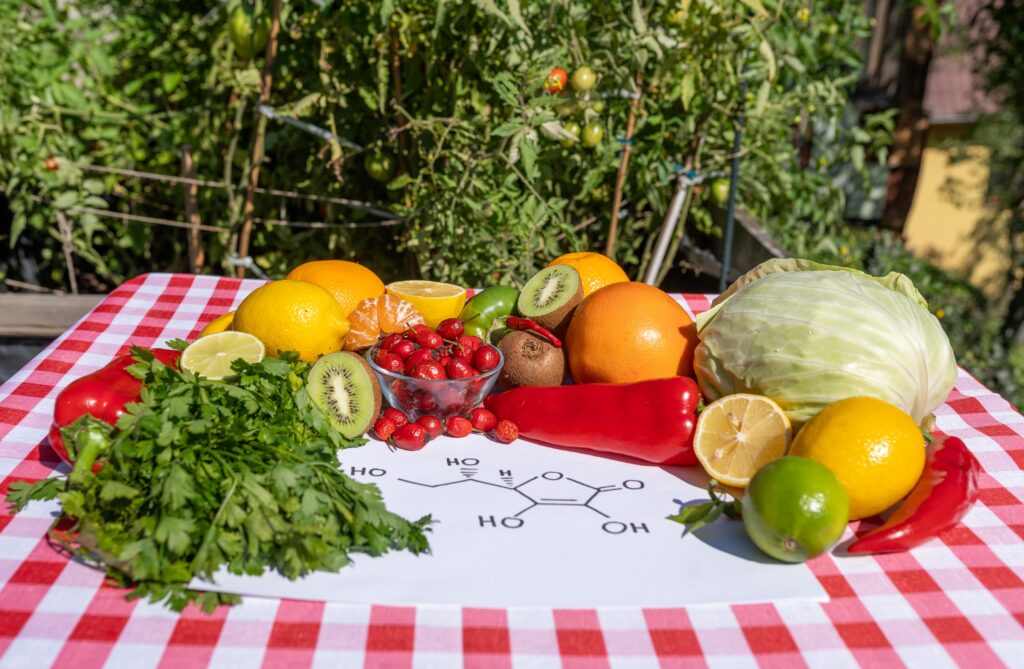 Vitamin C Good for health shown with oranges, lemons, and natural fruits